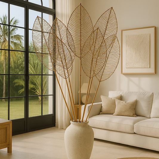 Living room with a large vase containing leaf-like decorations, a beige sofa, and a large window.