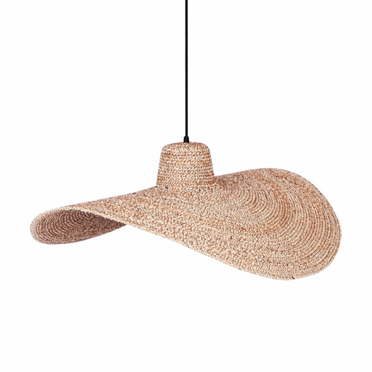 Rattan pendant light hanging against a white background