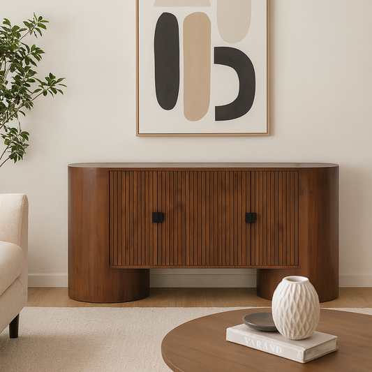 Wooden sideboard with abstract art above it in a living room setting.