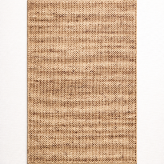 Beige woven rug on a white background