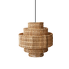 Set of three woven rattan pendant lights on a white background